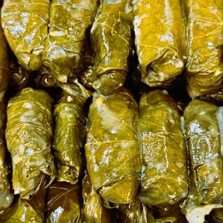 Dolma on Pita with Feta Cheese & Tzatziki
